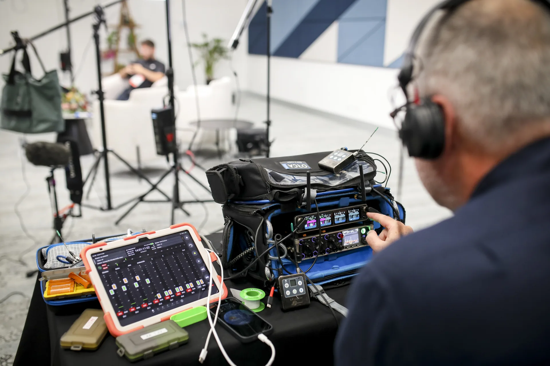 A Zarco Creative sound operator mixing live audio on set in Sydney