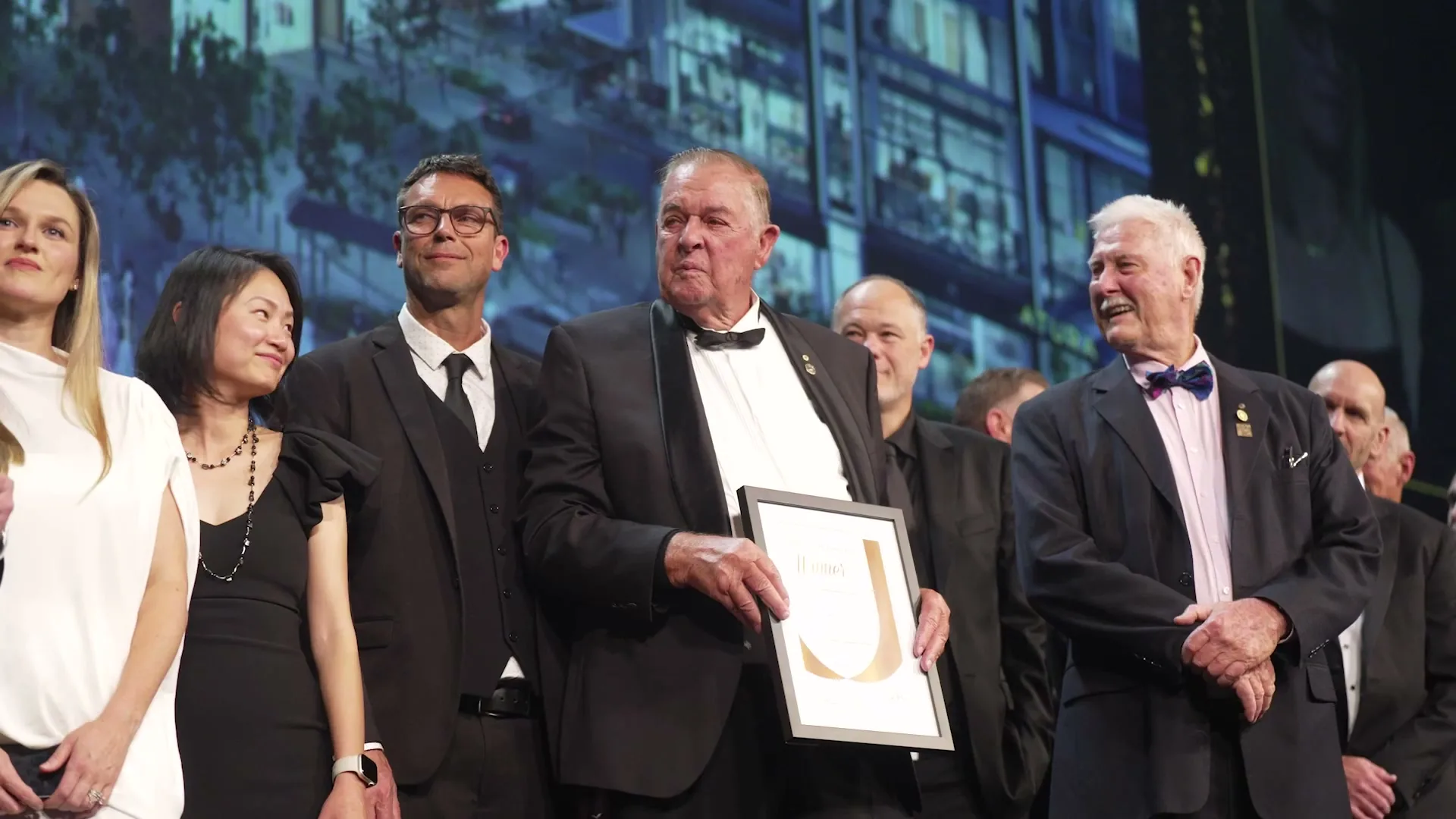 Winners on stage with their award at the UDIA NSW Awards for Excellence Gala, filmed by Zarco Creative