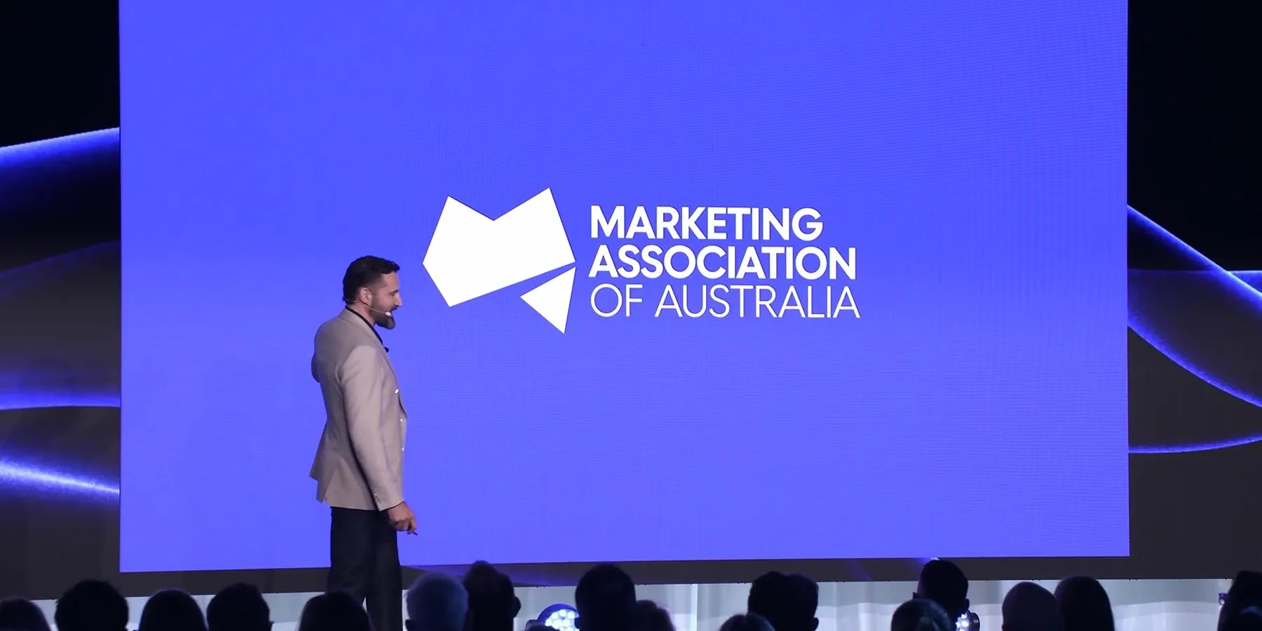 The Marketing Association of Australia identity revealed on the LED wall at RESET 2026 in Sydney