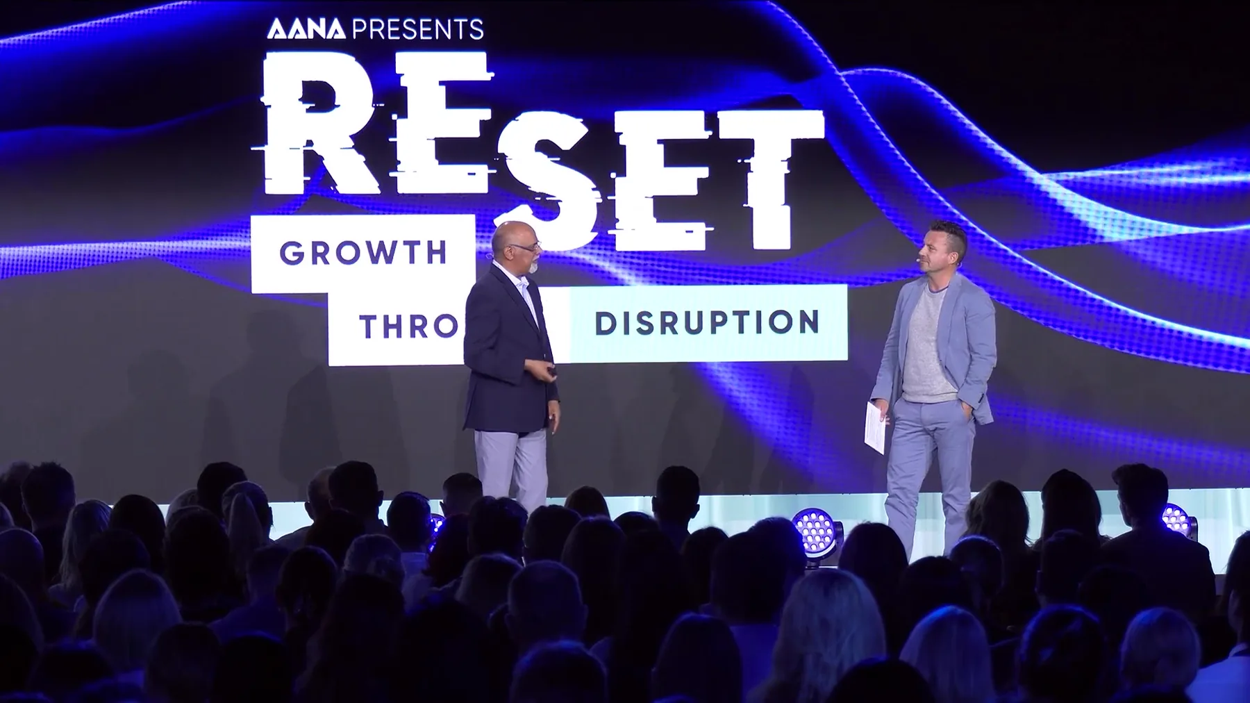 The main stage at RESET 2026 in Sydney, with the full room of delegates seated in front of it