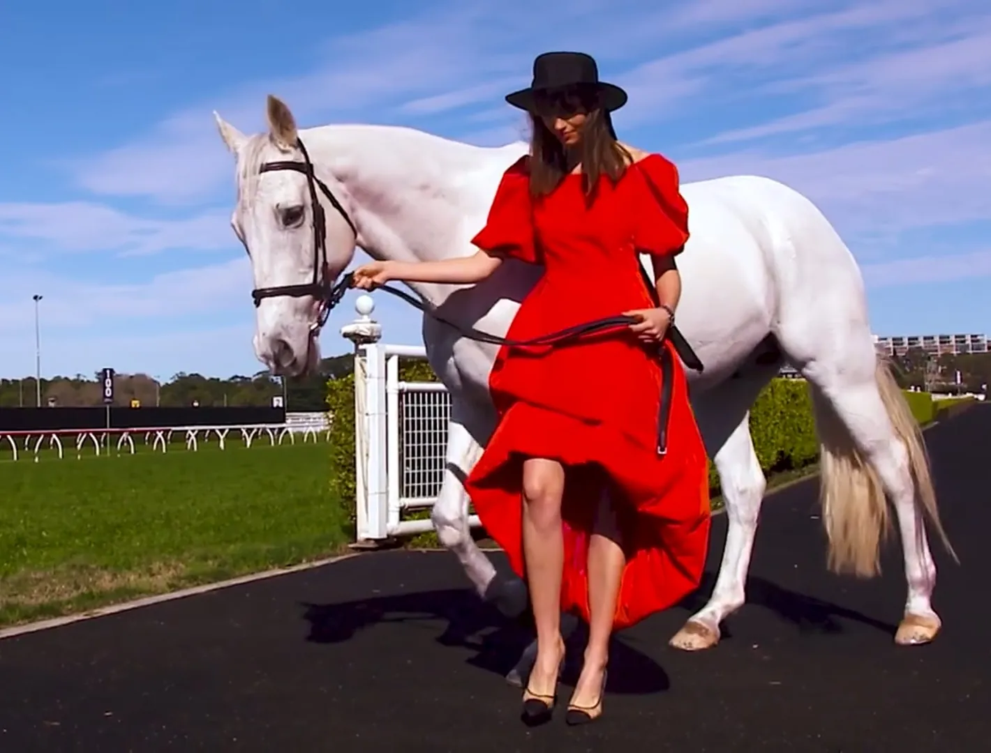 Stylist adjusting a headpiece on the Everest Carnival campaign shoot, filmed by Zarco Creative