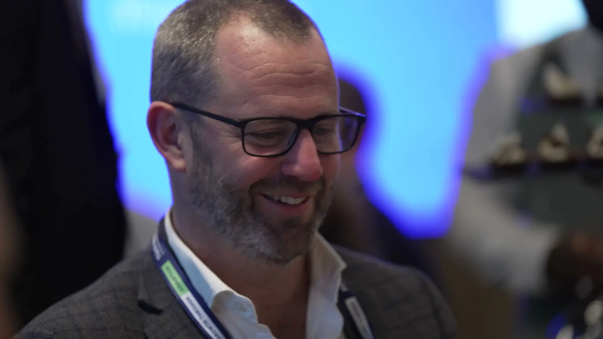 A delegate smiling at RESET 2026 in Sydney, filmed by Zarco Creative